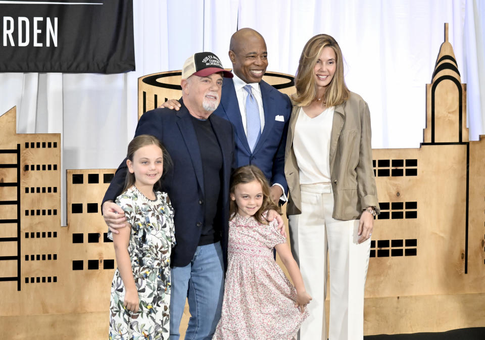 Billy Joel, left, poses with daughters and wife Alexis Roderick and New York City Mayor Eric Adams after announcing his Madison Square Garden residency will end after July 2024 at Madison Square Garden on Thursday, June 1, 2023, in New York. (Photo by Evan Agostini/Invision/AP)