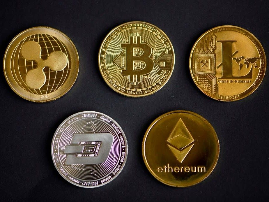 A market-wide cryptocurrency price crash in May has left many wondering whether it will recover (AFP via Getty Images)