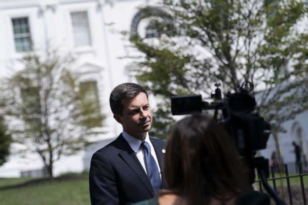 PHOTO: Pete Buttigieg, secretary of transportation, speaks to members of the media outside of the West Wing before US President Joe Biden signs H.R. 5376, the Inflation Reduction Act of 2022, at the White House in Washington, D.C., Aug. 16, 2022.  (Bloomberg via Getty Images)