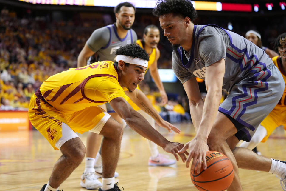 Iowa State guard Tamin Lipsey, left, tries to steal the ball from TCU guard Trevian Tennyson during the first half of an NCAA college basketball game, Saturday, Feb. 10, 2024, in Ames, Iowa. (AP Photo/Charlie Neibergall)