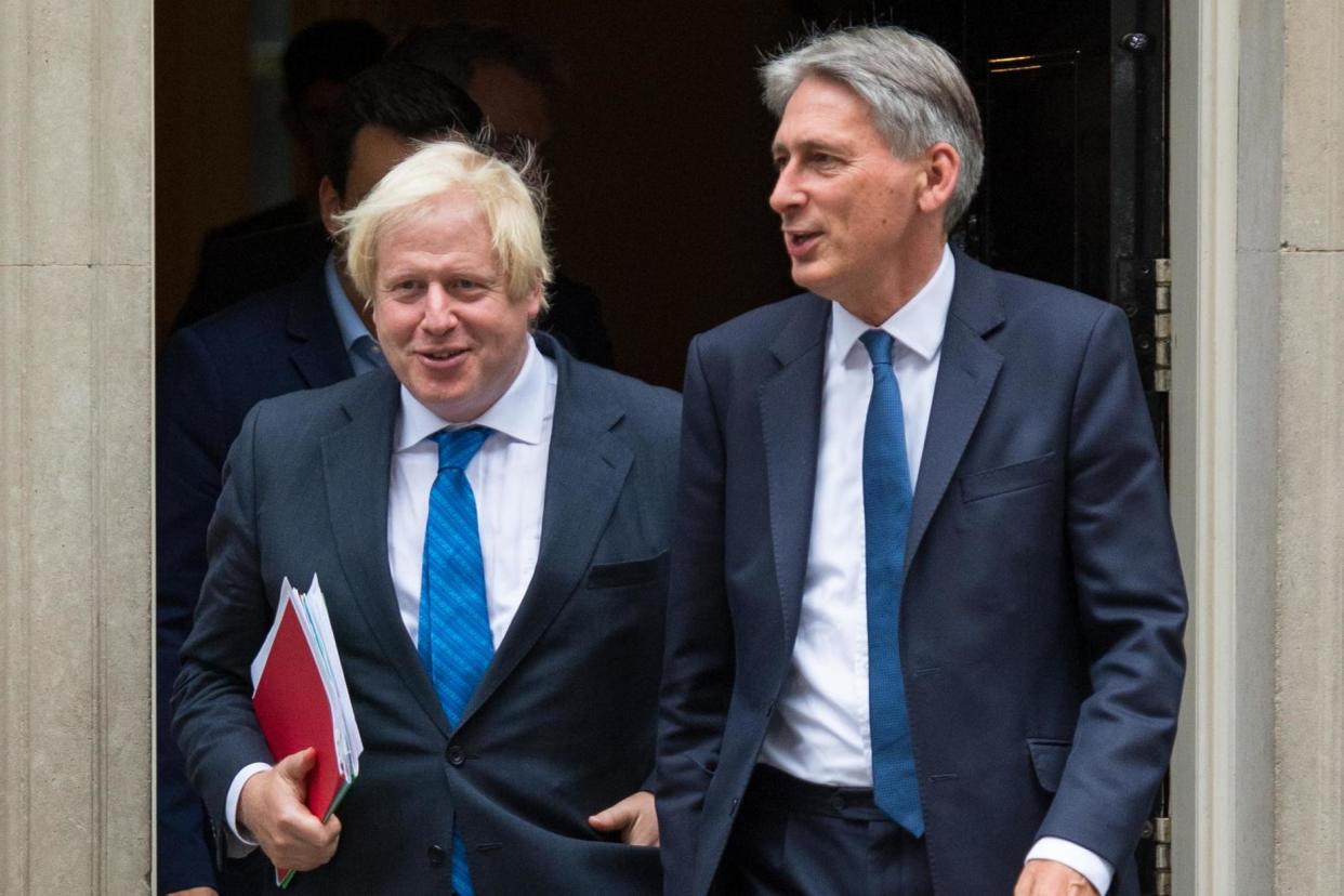 Boris Johnson and Philip Hammond pictured in 2017: Dominic Lipinski/PA