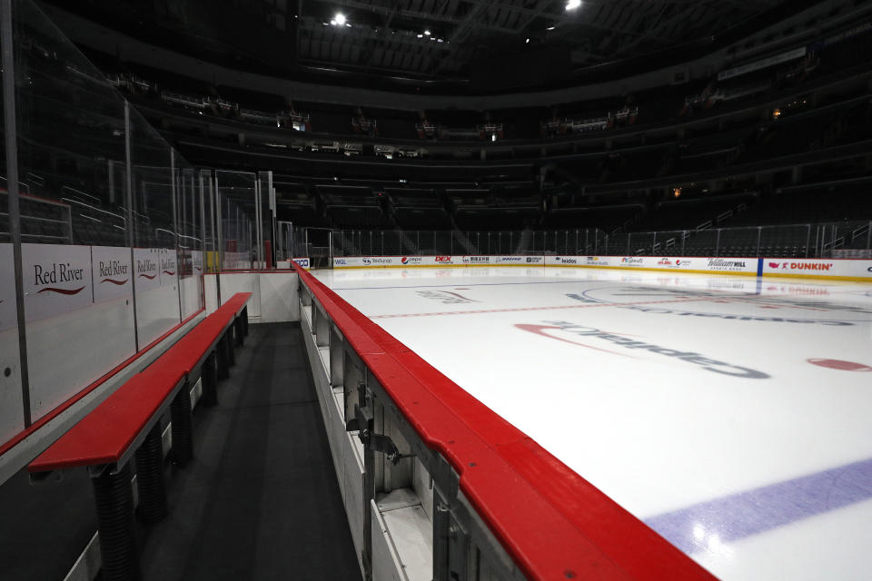 WASHINGTON, DC - MARCH 12: The ice, player's bench, and spectator seating are empty prior to the Detroit Red Wings playing against the Washington Capitals at Capital One Arena on March 12, 2020 in Washington, DC. Yesterday, the NBA suspended their season until further notice after a Utah Jazz player tested positive for the coronavirus (COVID-19). The NHL said per a release, that the uncertainty regarding next steps regarding the coronavirus, Clubs were advised not to conduct morning skates, practices or team meetings today. (Photo by Patrick Smith/Getty Images)
