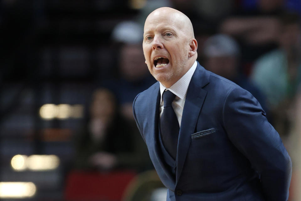 UCLA head coach Mick Cronin calls to his team during the first half of a first-round NCAA college basketball tournament game against Akron, Thursday, March 17, 2022, in Portland, Ore. (AP Photo/Craig Mitchelldyer)