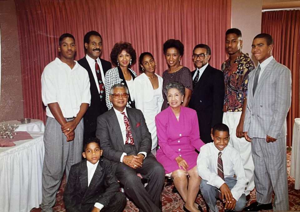 Bettylu Donaldson (center row, right) smiles for a photo surrounded by her husband Davenport Donaldson (center row, left), daughter Dianne Cleaver (top row, third from left), son-in-law Emannuel Cleaver II (top row, second from left) and other family members. She had four children and helped her son-in-law during his multiple campaigns for office.