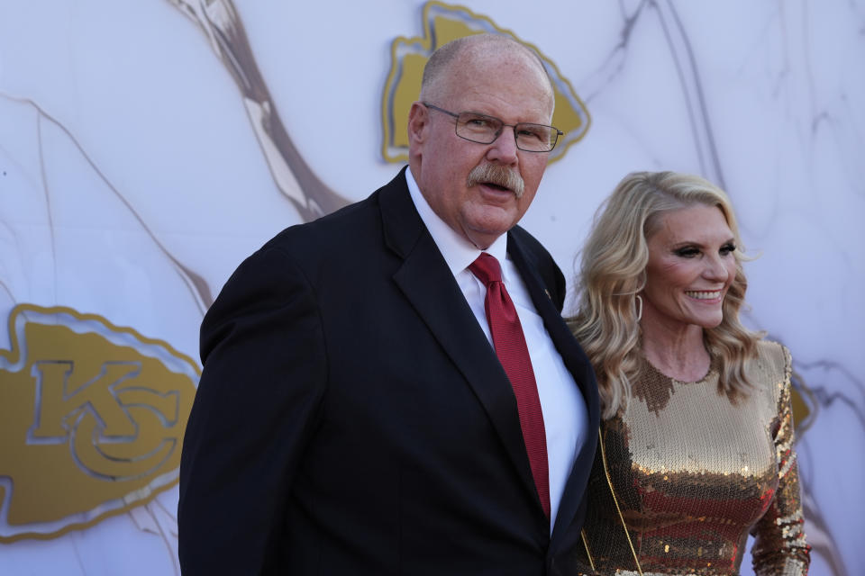 Kansas City Chiefs head coach Andy Reid and his wife Tammy arrive on the red carpet before a ceremony for team members to receive their championship rings for winning NFL's Super Bowl 58 football game Thursday, June 13, 2024, in Kansas City, Mo. (AP Photo/Charlie Riedel)