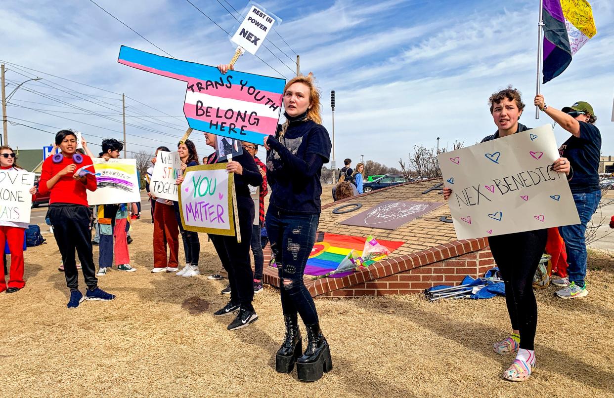 Owasso students and supporters gather Monday outside Owasso High School to hold a peaceful demonstration in honor of Nex Benedict, calling on school and state officials to better protect LGBTQ+ students.