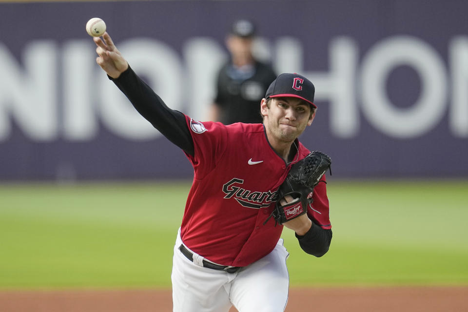 Cleveland Guardians' Gavin Williams pitches in the first inning of a baseball game against the Philadelphia Phillies, Friday, July 21, 2023, in Cleveland. (AP Photo/Sue Ogrocki)