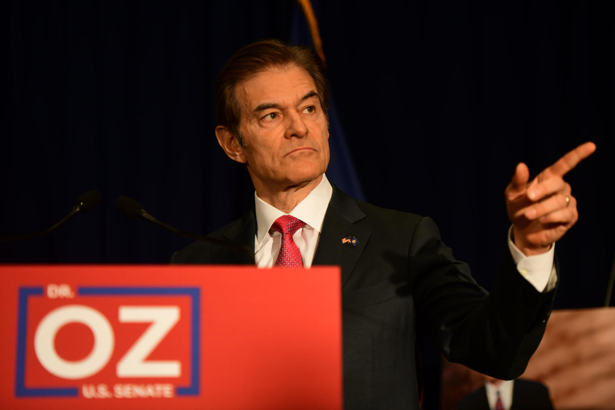 Republican U.S. Senate candidate Dr. Mehmet Oz holds a press conference with Pennsylvania Republican Sen. Pat Toomey in Philadelphia in September. 