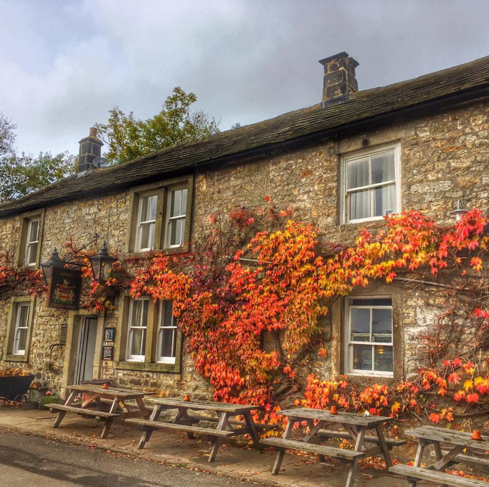 <p><span>Explore the Yorkshire dales before refuelling at <a rel="nofollow noopener" href="http://www.craven-cruckbarn.co.uk/" target="_blank" data-ylk="slk:this lovely stone pub;elm:context_link;itc:0;sec:content-canvas" class="link ">this lovely stone pub</a>, which is tucked into the fell above the river Wharfe. Look out for the "cruck barn" at the back, built by the owner using traditional materials and the first in the dale for 400 years. [Photo: Instagram / </span><a rel="nofollow noopener" href="https://www.instagram.com/yorkstriketours/" target="_blank" data-ylk="slk:yorkstriketours;elm:context_link;itc:0;sec:content-canvas" class="link "><span>yorkstriketours</span></a><span>]</span> </p>