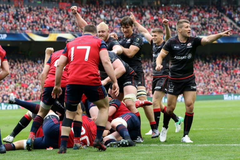 Saracens' players celebrate as Mako Vunipola scores the first try during their rugby union European Champions Cup semi-final match against Munster, at the Aviva stadium in Dublin, on April 22, 2017