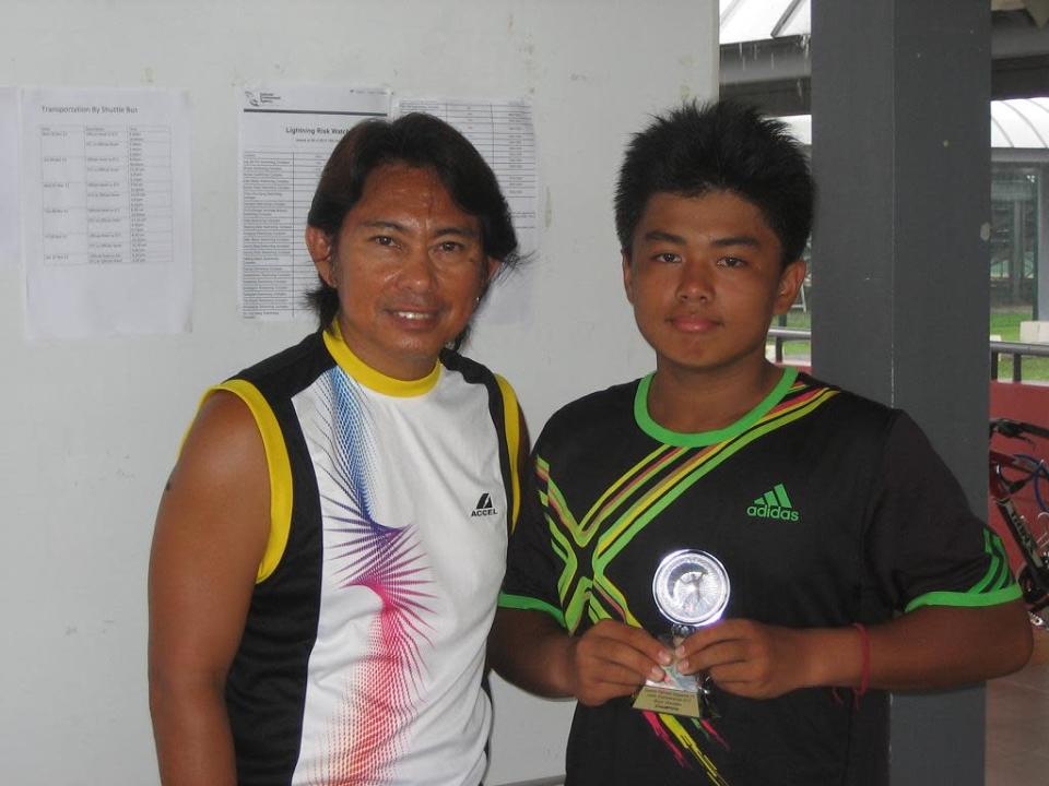 Alberto Lim with coach Manny Tecson. (Photo courtesy of Manny Tecson)