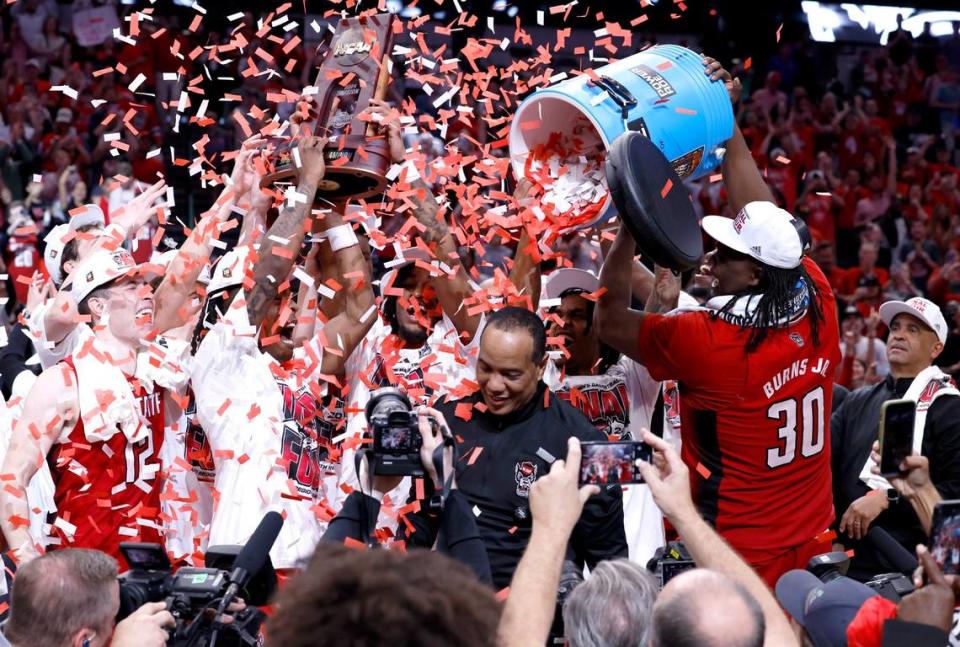 The team dumps confetti after their 76-64 victory over Duke in their NCAA Tournament Elite Eight matchup at the American Airlines Center in Dallas, Texas, Sunday, March 31, 2024.