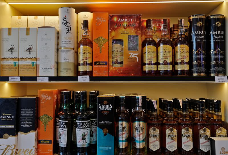 Whisky bottles are kept for sale at a liquor shop in Gurugram