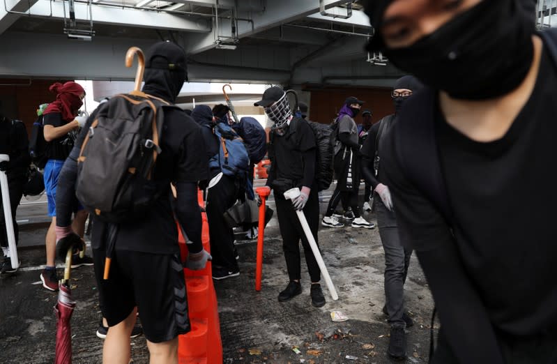 Anti-government demonstrators attend a protest march in Hong Kong