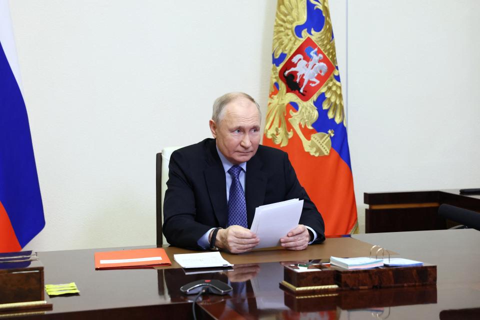 In this pool photograph distributed by Russian state agency Sputnik, Russia's President Vladimir Putin chairs a Security Council meeting via a videoconference at the Novo-Ogaryovo state residence, outside Moscow, on February 13, 2024. (Photo by Sergei ILYIN / POOL / AFP) (Photo by SERGEI ILYIN/POOL/AFP via Getty Images)