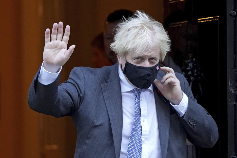 Prime Minister Boris Johnson departs 10 Downing Street, London, Tuesday, Nov. 9 2021. (Stefan Rousseau/PA via AP)