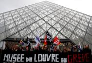 Striking workers block entry to Louvre Museum in Paris