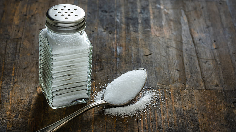 table salt with spoon