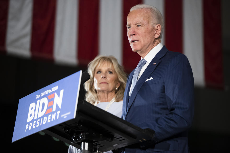 Democratic presidential candidate former Vice President Joe Biden, accompanied by his wife Jill, speaks to members of the press at the National Constitution Center in Philadelphia, Tuesday, March 10, 2020. (AP Photo/Matt Rourke)