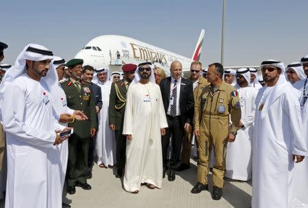 United Arab Emirates Vice President, Prime Minister and Dubai Ruler Sheikh Mohammed bin Rashid al-Maktoum (C) tours the Dubai Airshow November 8, 2015. REUTERS/Ahmed Jadallah