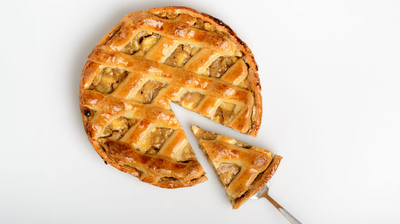 lattice-topped pie with slice cut out