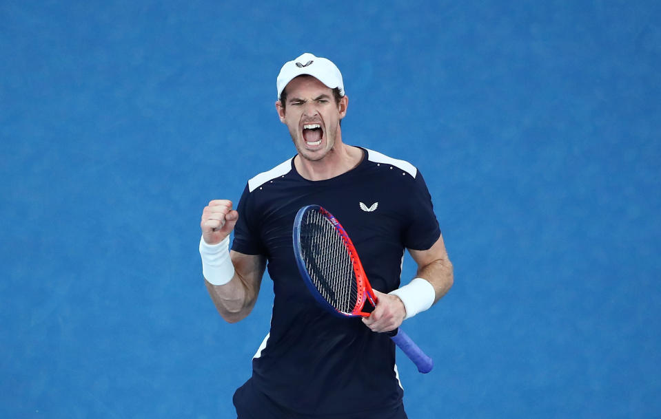MELBOURNE, AUSTRALIA - JANUARY 14:  Andy Murray of Great Britain celebrates winning the third set in his first round match against Roberto Bautista Agut of Spain during day one of the 2019 Australian Open at Melbourne Park on January 14, 2019 in Melbourne, Australia. (Photo by Scott Barbour/Getty Images)
