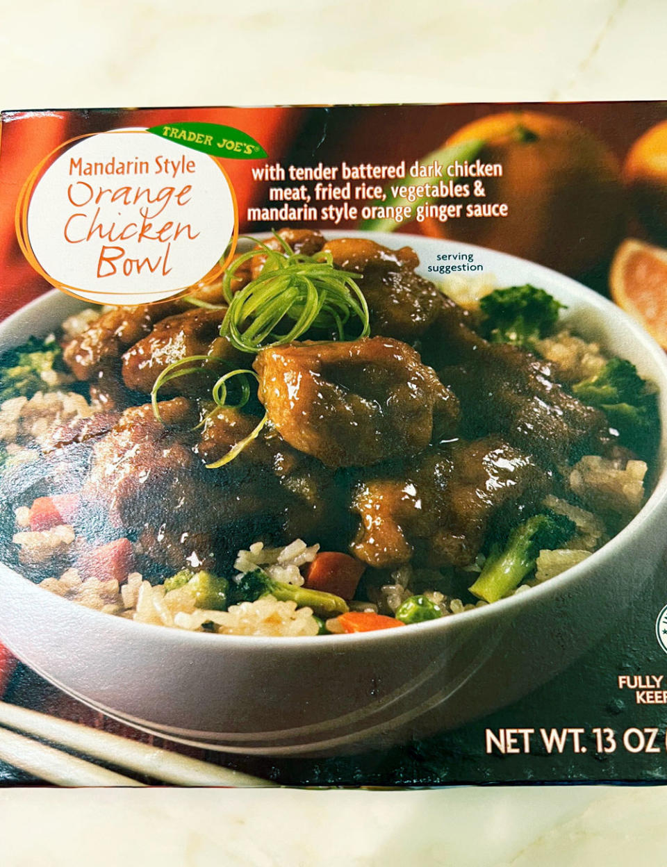 A box of Trader Joe's Mandarin-style orange chicken bowl