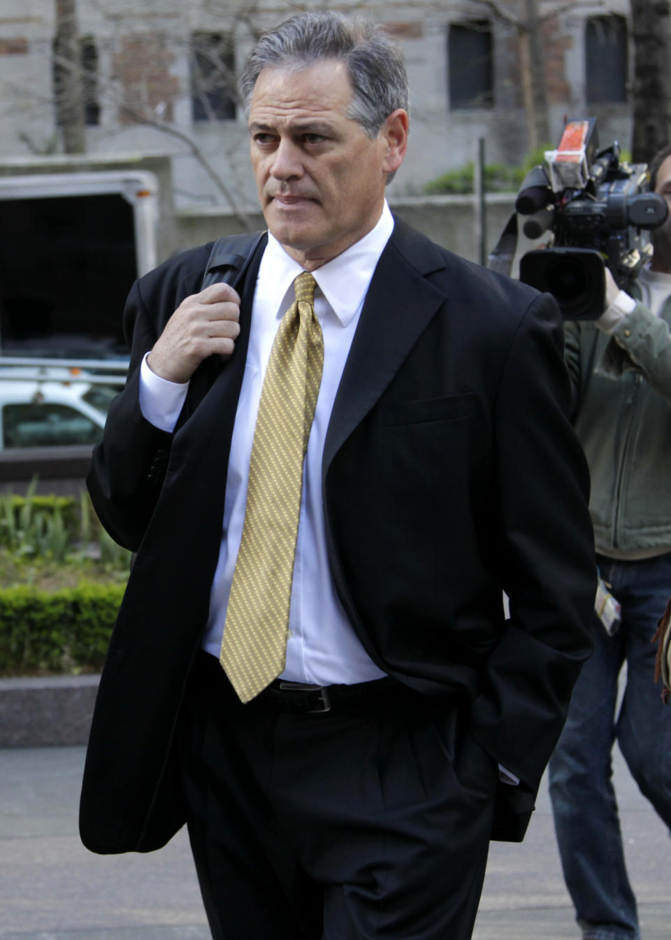 New Orleans Saints' general manager Mickey Loomis arrives for a meeting at NFL headquarters in New York, Thursday, April 5, 2012. Loomis and assistant coach Joe Vitt arrived to appeal their suspensions in the New Orleans bounty case. (AP Photo/Seth Wenig)