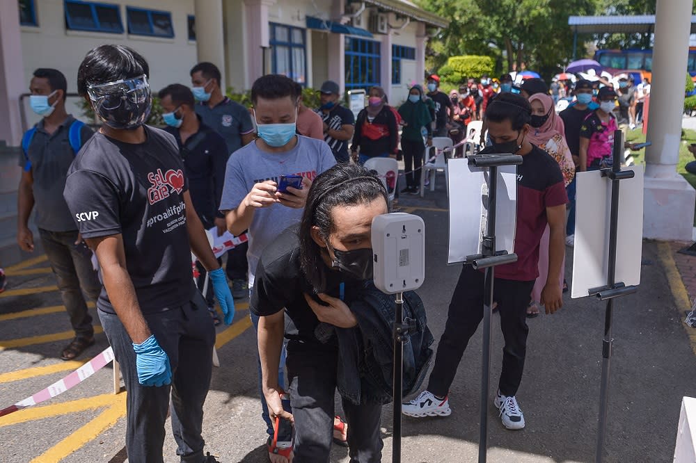 Penang opened walk-in vaccination for foreign workers at four designated PPVs on September 17. — Picture by Miera Zulyana