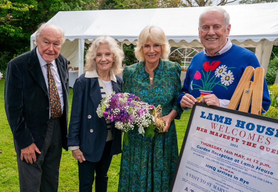 Queen Camilla (CR) is seen meeting Hayley Mills (CL), actor Timothy West (L) and Gyles Brandreth (R) during a garden party at Lamb House on May 16, 2024 in Rye, England. (Getty Images)