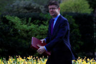 FILE PHOTO: Britain's Secretary of State for Business Greg Clark walks at Downing Street in London, Britain April 10, 2019. REUTERS/Gonzalo Fuentes/File Photo