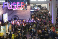 Gaming enthusiasts attend the Pax East conference, Thursday, Feb. 27, 2020, in Boston. Thousands of gaming enthusiasts attended the Pax East conference that opened in Boston on Thursday, but a marquee industry player was missing: PlayStation-maker Sony. (AP Photo/Steven Senne)