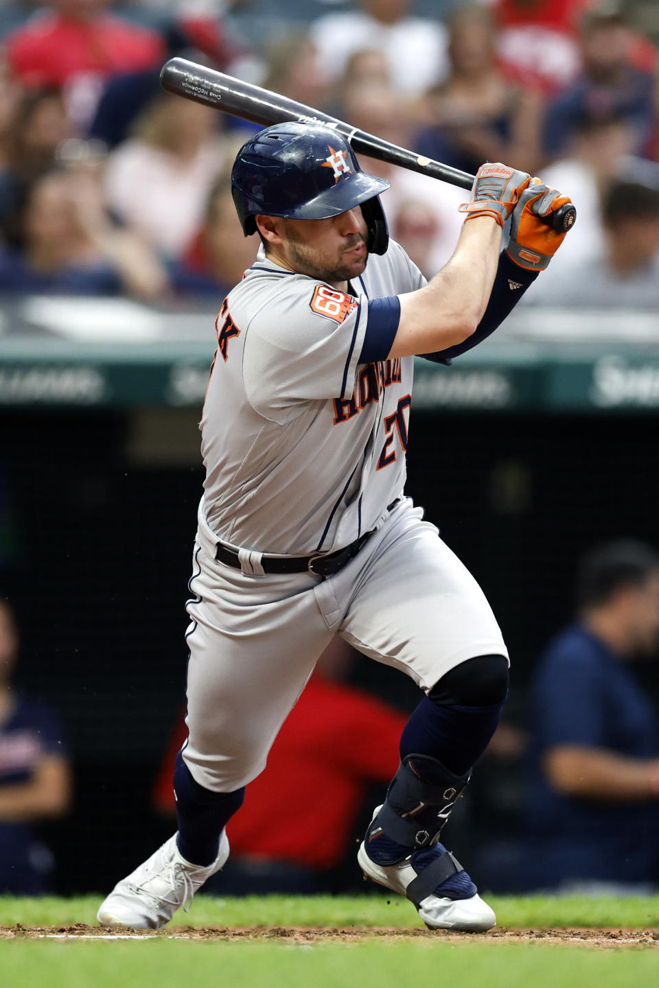 Houston Astros' Chas McCormick watches his RBI single off Cleveland Guardians starting pitcher Zach Plesac during the third inning of a baseball game Thursday, Aug. 4, 2022, in Cleveland. (AP Photo/Ron Schwane)