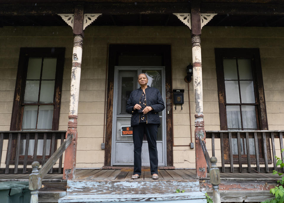 Brightwood resident Carol Lightfoot, 73, stands on her front porch on May 22. | Nate Palmer for TIME