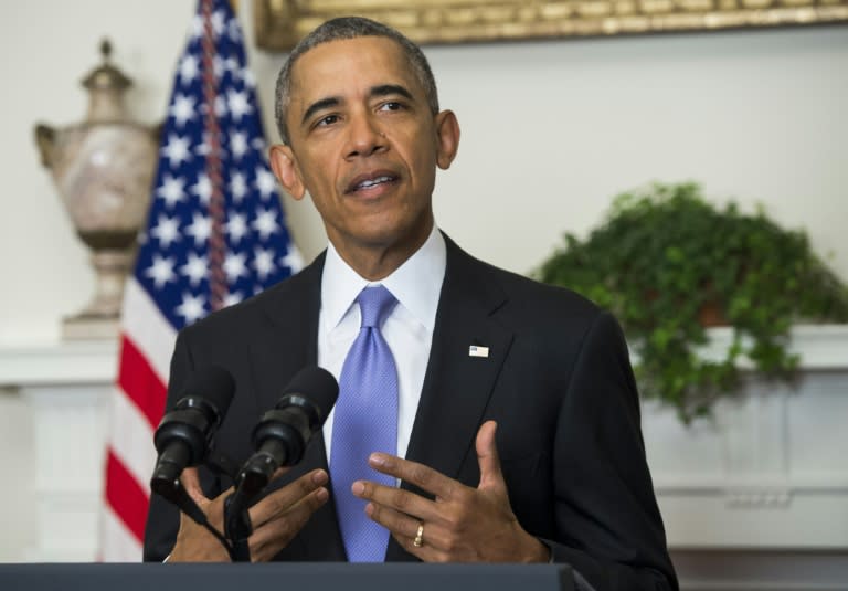 US President Barack Obama speaks about US-Iranian relations, including the Iranian-American nationals that were jailed in Iran and are being freed as part of a prisoner swap, in the Cabinet Room of the White House in Washington, DC, January 17, 2016