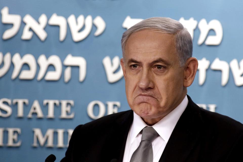 Israel's Prime Minister Benjamin Netanyahu is pictured during a news conference at his office in Jerusalem December 2, 2014. Prime Minister Benjamin Netanyahu sacked his finance and justice ministers on Tuesday, signalling the break up of his bickering coalition and opening the way for early national elections in Israel. REUTERS/Gali Tibbon/Pool (JERUSALEM - Tags: POLITICS TPX IMAGES OF THE DAY)