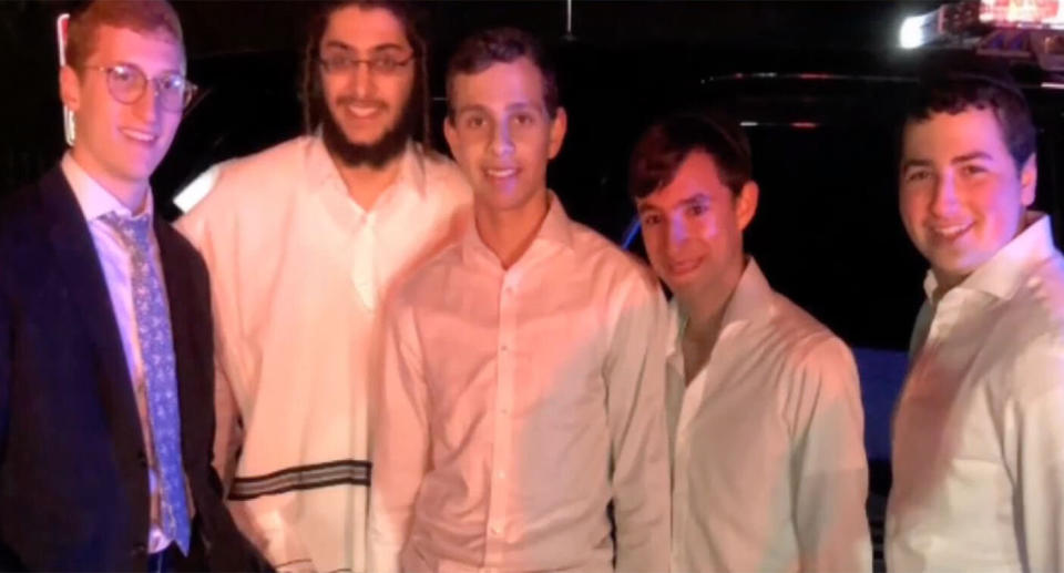 The group of Jewish boys photographed standing together.