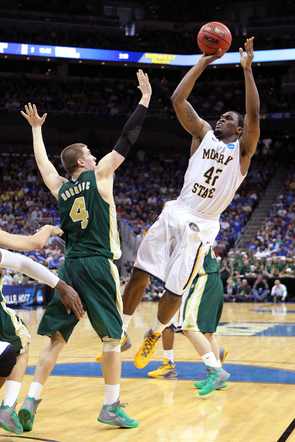 LOUISVILLE, KY - MARCH 15: Ivan Aska #42 of the Murray State Racers shoots the ball over Pierce Hornung #4 of the Colorado State Rams during the second round of the 2012 NCAA Men's Basketball Tournament at KFC YUM! Center on March 15, 2012 in Louisville, Kentucky. (Photo by Andy Lyons/Getty Images)