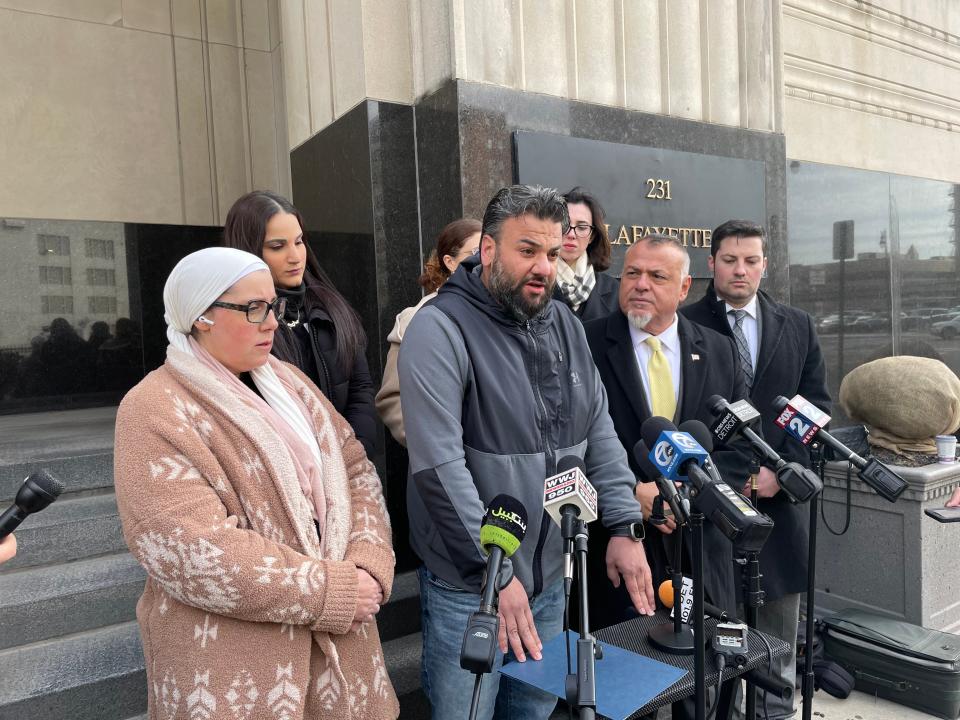 Yahya Alarayshi and his wife, Lisa Alarayshi, (left) of Canton, speak on Nov. 2, 2023, outside the U.S. federal district courthouse on Lafayette in Detroit. They are asking the U.S. government to help rescue their parents, Zakaria Alarayashi and his wife, Laila Alarayshi, of Liovnia, and other Palestinian Americans stuck in Gaza.