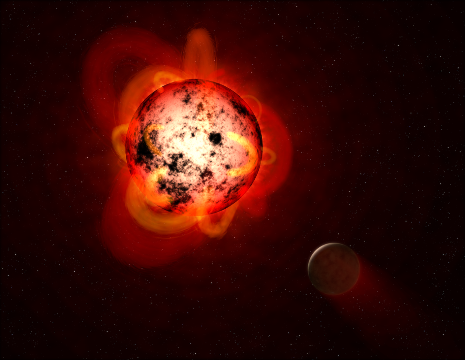 Artist’s concept of a red dwarf star with an exoplanet in orbit. About two-thirds of the stars in the Milky Way are red dwarfs. Exoplanet is the name for worlds outside our solar system. <a href="https://www.nasa.gov/image-feature/jpl/pia21473/flaring-red-dwarf-star" rel="nofollow noopener" target="_blank" data-ylk="slk:NASA/ESA/G.Bacon/STScI;elm:context_link;itc:0;sec:content-canvas" class="link ">NASA/ESA/G.Bacon/STScI</a>