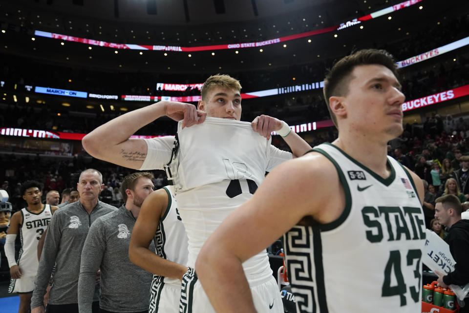 Michigan State players walk off the court after an NCAA college basketball game against Ohio State at the Big Ten men's tournament, Friday, March 10, 2023, in Chicago. Ohio State won 68-58. (AP Photo/Erin Hooley)