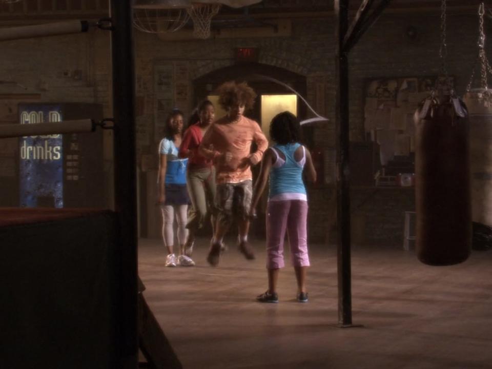 The cast of "Jump In" jumping rope in a boxing gym