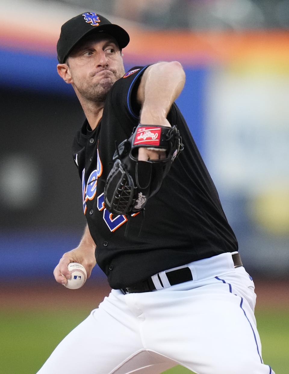 New York Mets' Max Scherzer winds up during the first inning of the team's baseball game against the Washington Nationals on Friday, July 28, 2023, in New York. (AP Photo/Frank Franklin II)