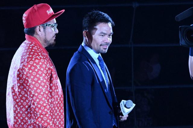 Mayweather’s former arch-rival Manny Pacquiao watched the contest from ringside (AFP via Getty Images)