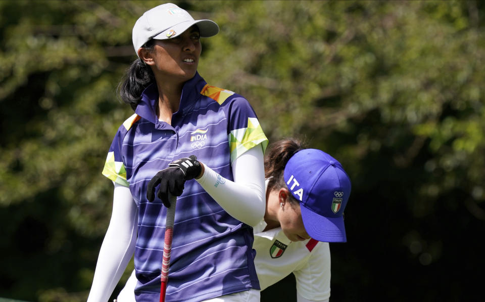 Aditi Ashok, of India, watches her tee shot on the second hole during the first round of the women's golf event at the 2020 Summer Olympics, Wednesday, Aug. 4, 2021, at the Kasumigaseki Country Club in Kawagoe, Japan. (AP Photo/Matt York)