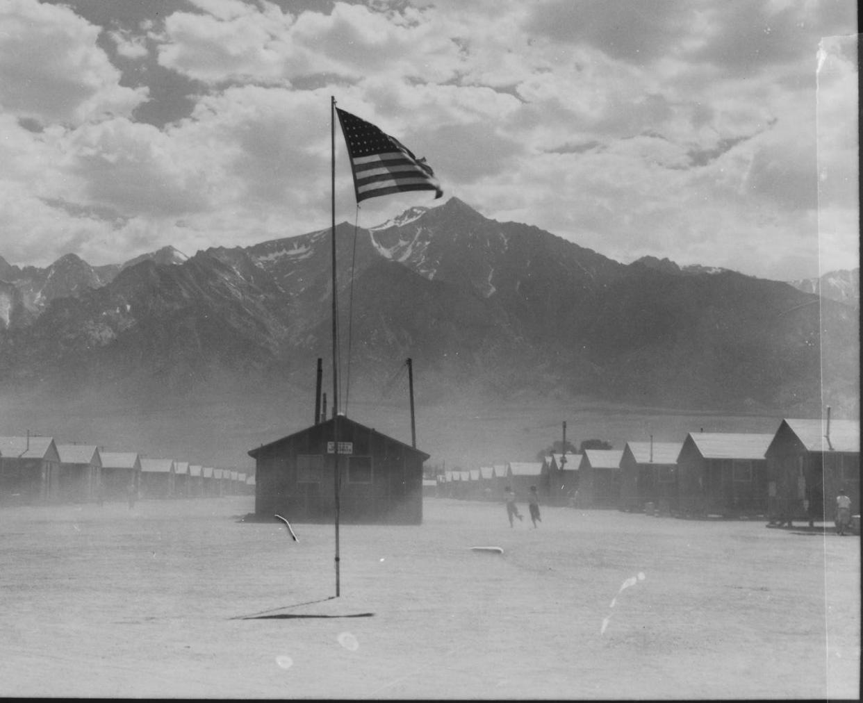 <span class="caption">Dust storm on July 3, 1942, at the Manzanar War Relocation Authority Center in California.</span> <span class="attribution"><a class="link " href="https://catalog.archives.gov/id/539961" rel="nofollow noopener" target="_blank" data-ylk="slk:Dorothea Lange/Courtesy of National Archives and Records Administration;elm:context_link;itc:0;sec:content-canvas">Dorothea Lange/Courtesy of National Archives and Records Administration</a></span>