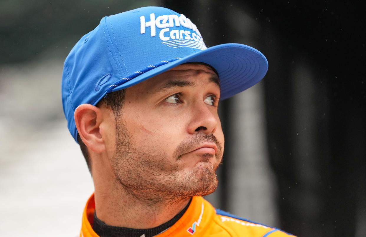 Arrow McLaren/Rick Hendrick driver Kyle Larson (17) watches the rain fall Tuesday, May 14, 2024, during the first day of practice ahead of the 108th running of the Indianapolis 500 at Indianapolis Motor Speedway.