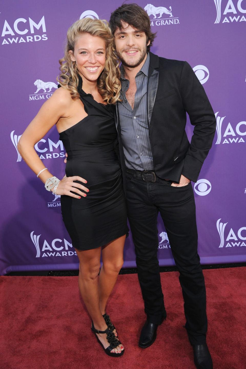 <p>Up for four awards this year, Thomas Rhett posed alongside<a href="https://people.com/country/inside-thomas-rhett-wife-laurens-sweet-love-story/" rel="nofollow noopener" target="_blank" data-ylk="slk:wife Lauren Akins;elm:context_link;itc:0;sec:content-canvas" class="link "> wife Lauren Akins</a> in 2012, looking super cute in coordinated black looks.</p> <p>This was the year the two <a href="https://people.com/country/thomas-rhett-anniversary-tribute-pregnant-wife-lauren/" rel="nofollow noopener" target="_blank" data-ylk="slk:tied the knot;elm:context_link;itc:0;sec:content-canvas" class="link ">tied the knot</a>, and now they are <a href="https://people.com/parents/thomas-rhett-calls-wife-laura-akins-his-hero/" rel="nofollow noopener" target="_blank" data-ylk="slk:parents to three daughters;elm:context_link;itc:0;sec:content-canvas" class="link ">parents to three daughters</a>, Willa Gray, Ada James and Lennon Love.</p>