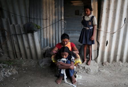 The Wider Image: The Indian children who take a train to collect water