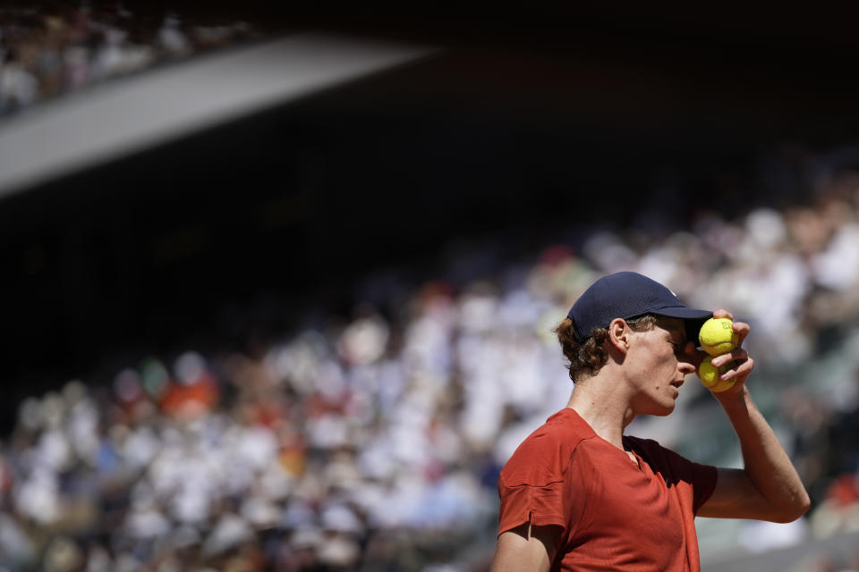 Italy's Jannik Sinner preapres to serve against Spain's Carlos Alcaraz during their semifinal match of the French Open tennis tournament at the Roland Garros stadium in Paris, Friday, June 7, 2024. (AP Photo/Christophe Ena)